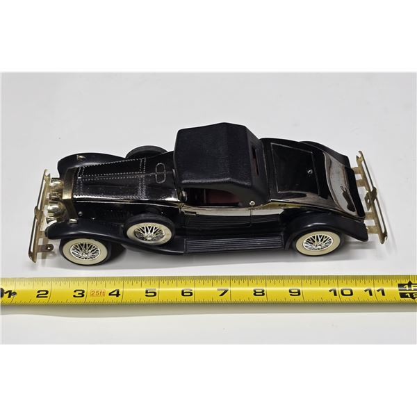 Antique-Car Radio – Working.  Has some repairs, battery compartment still opens and closes.