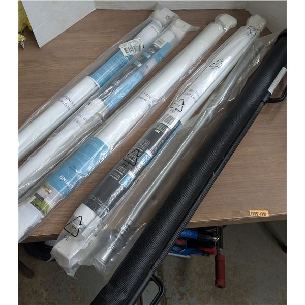 Roller blinds,3 sets new in packaging, one used. Includes one short curtain rod.