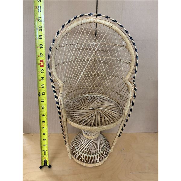 Vintage mini wicker peacock chair.