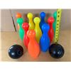 Image 2 : Kids 10 colorful, lightweight bowling pins and two black bowling balls.