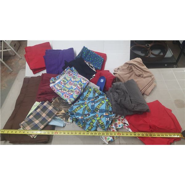 Large assortment of fabric scraps in various colors and patterns.