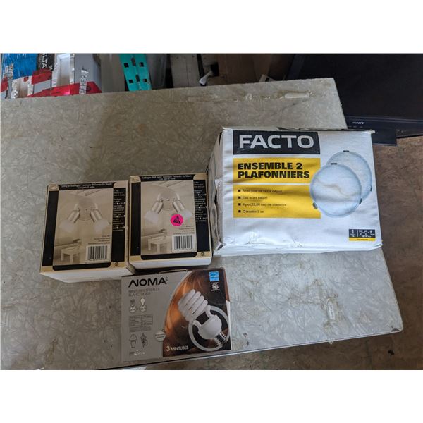 3 light fixtures, new in packaging, with light bulbs