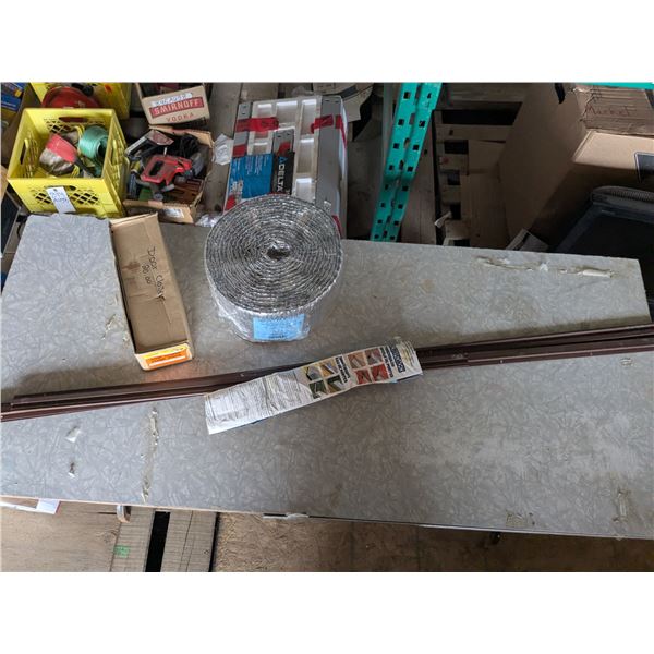 Door closer, weather stripping and 6" foil bubbles