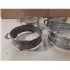 Image 3 : Vintage silver-plated casserole dish holders or trivets, often used to protect tables from hot dishe