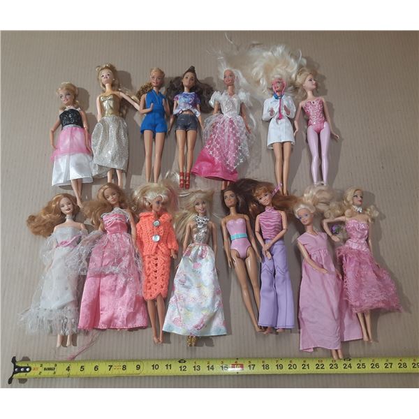 Lot of (15) Barbie Dolls.