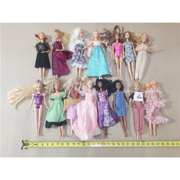 Lot of (15) Barbie Dolls.