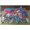 Image 1 : Large assortment of vintage and modern Barbie furniture and doll accessories.