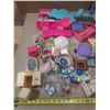 Image 2 : Large assortment of vintage and modern Barbie furniture and doll accessories.