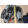 Image 7 : U.S. Divers snorkeling set, featuring a mask, snorkel, and adjustable fins, all packed in a clear ca