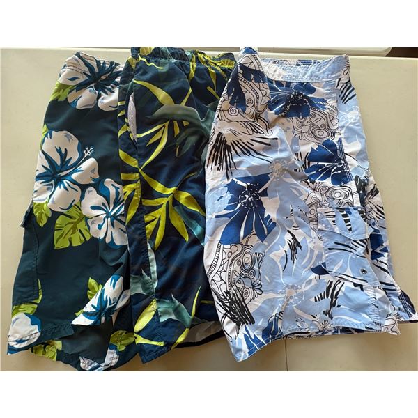 (3) Men's Swim Shorts - (2) 3XL and (1) 2XL.