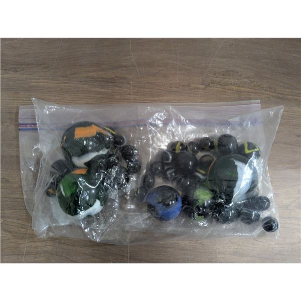 Bag of XXL marbles and black/dark glass marbles