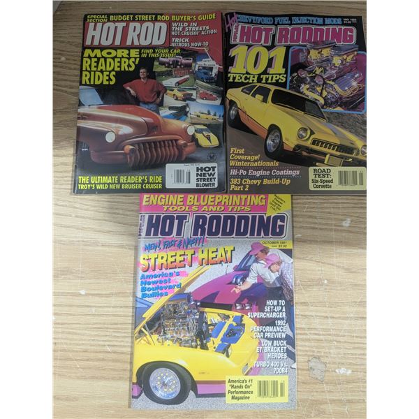 3- early 1990s car magazines, opened