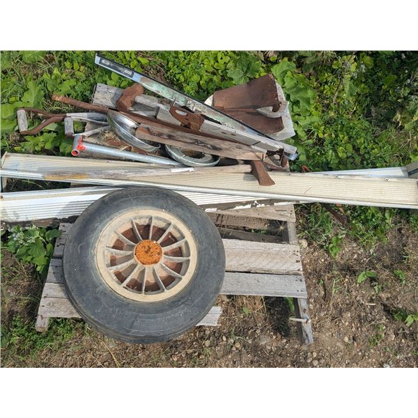 Mixed pallet lot, Plane tire, truck parts, yard tools