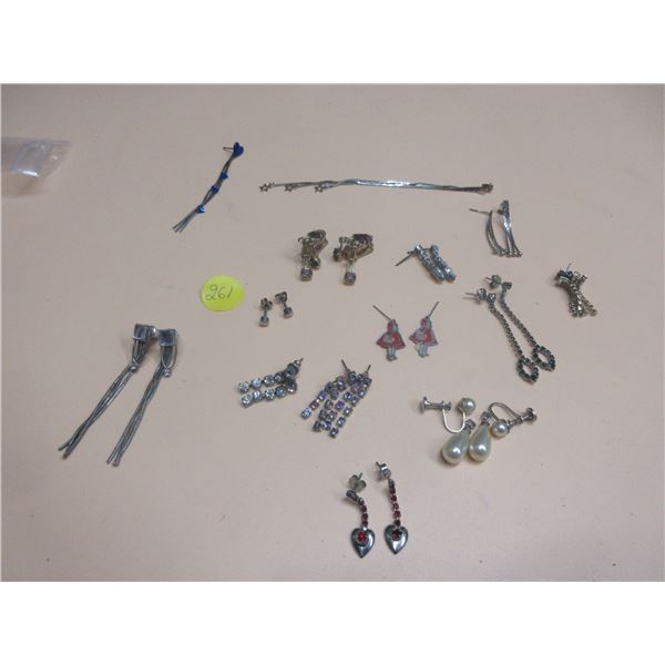 12 pair of silver earrings- non-magnetic, cannot verify the authenticity