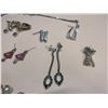 Image 4 : 12 pair of silver earrings- non-magnetic, cannot verify the authenticity