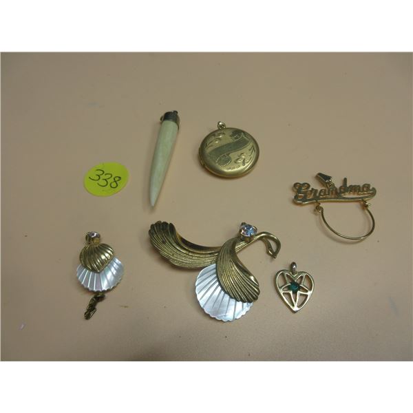 Lot of 6 gold coloured pendents- can be gold, but cannot verify the authenticity