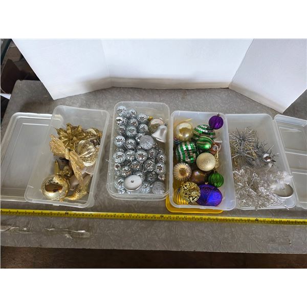 Containers full of christmas ornaments