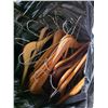 Image 3 : Bag full of wooden coat hangers