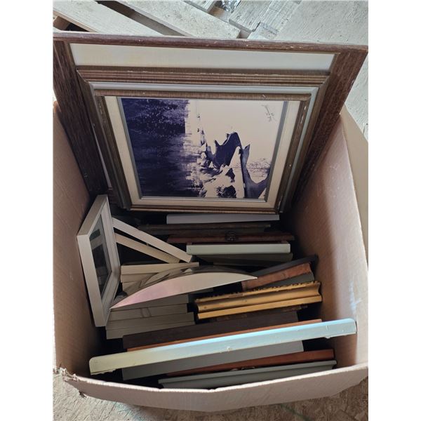 Box of various pictures and frames