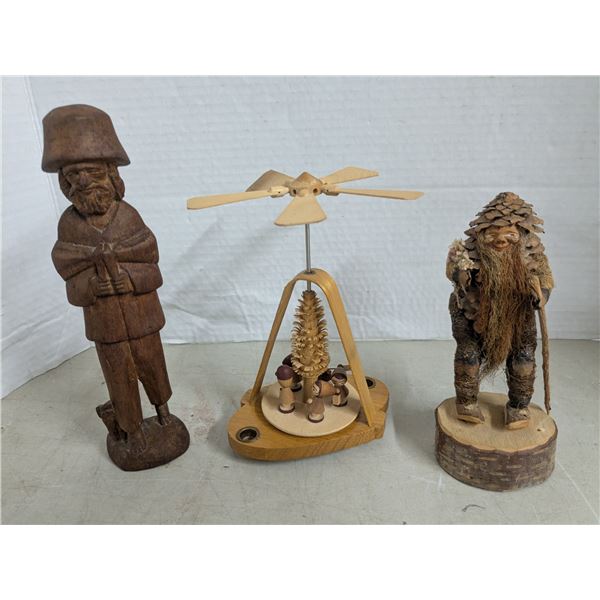 Carved wood décor, people