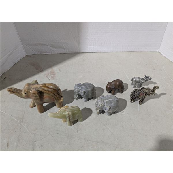 Stone and metal elephant ornaments