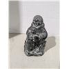 Image 1 : Soapstone carving, eskimo with dogs