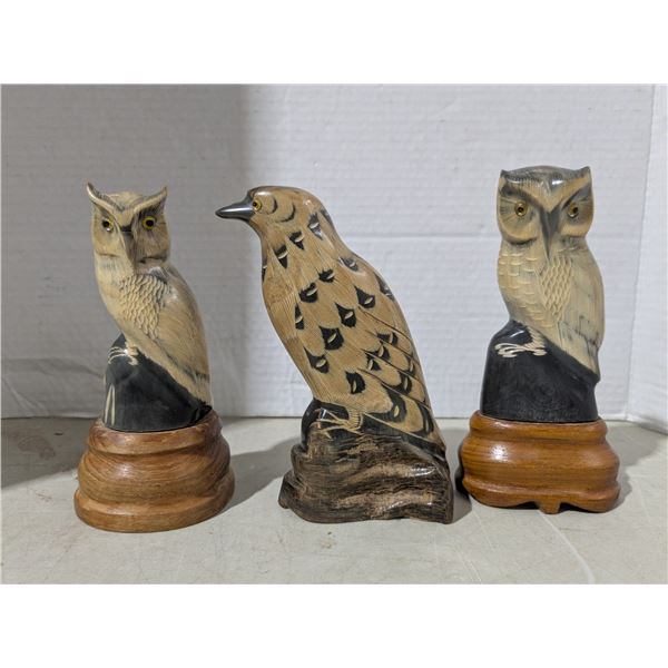 Carved animal horn birds