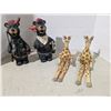 Image 1 : Carved wood décor, giraffes and goofy bears