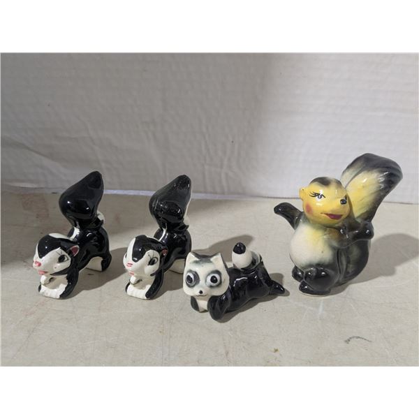 Porcelain/Ceramic skunks
