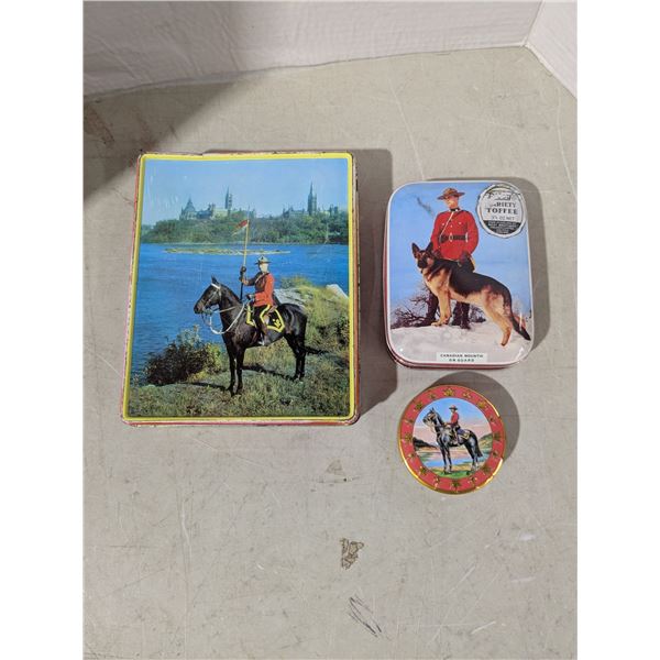 3 vintage mountie themed tins