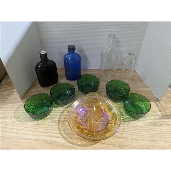 Glass bottles with colored glass dishes