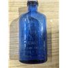 Image 5 : Glass bottles with colored glass dishes