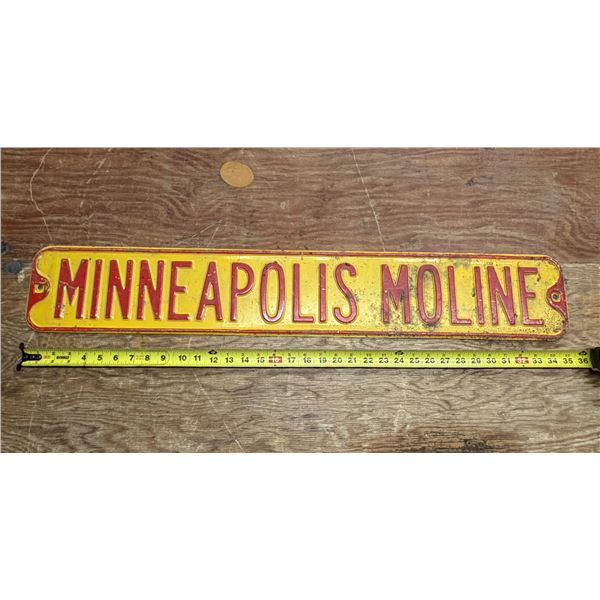 Vintage embossed metal Minneapolis-Moline farm implement dealership or road sign. (Length 35.5 Inch)