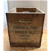 Image 4 : Vintage mid-20th-century Canada Dry wooden soda crate featuring the iconic green diagonal banner and