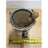 Image 2 : Vintage mid-20th-century metal cone sieve and tripod stand set featuring a fine mesh strainer, match