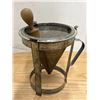 Image 3 : Vintage mid-20th-century metal cone sieve and tripod stand set featuring a fine mesh strainer, match