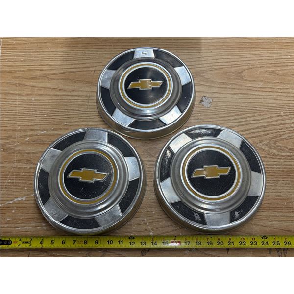 Set of three vintage 1973–1987 Chevrolet 1/2-ton truck "dog dish" (or poverty) hubcaps, mea
