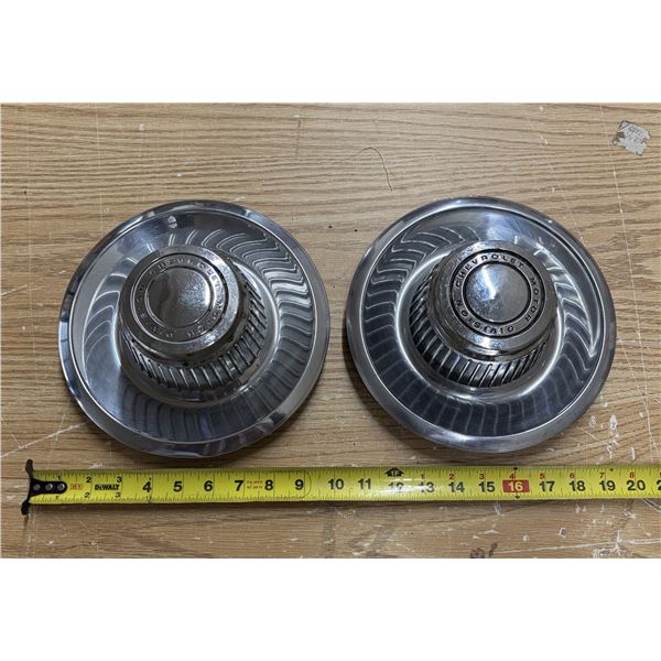 Vintage Chevrolet Motor Division "high-hat" derby-style rally wheel center caps.