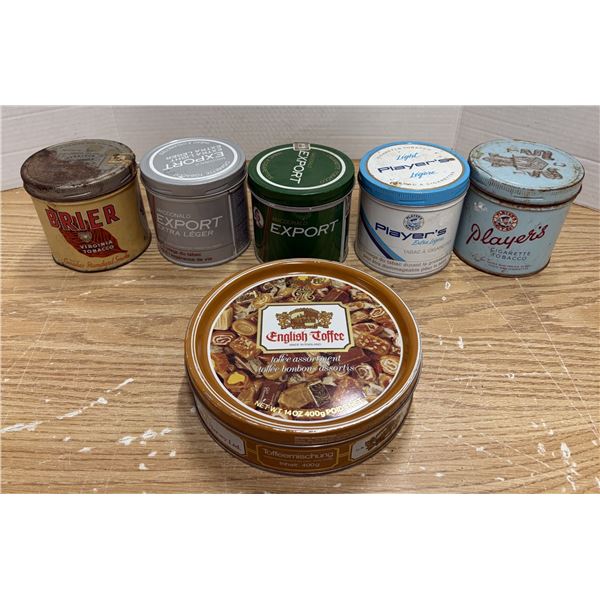 Vintage Canadian tobacco and cigarette tins alongside a decorative English Toffee tin.