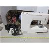 Image 1 : Kenmore sewing machine and Kenmore bag with attchments