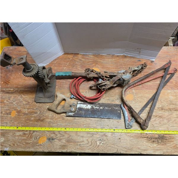 Lot of various tools, saws, antique jack, winch