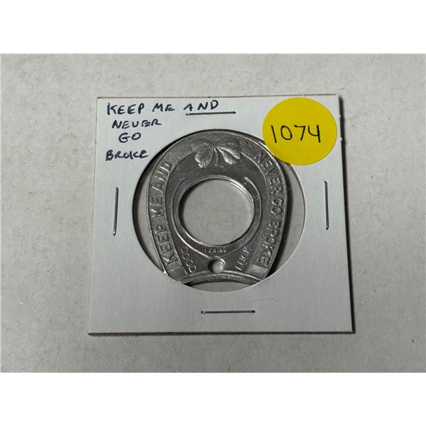 Keep Me and Never Go Broke aluminum holder for a Canadian or U.S. Small Cent.