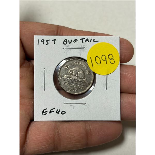 1957 Bug Tail 5 Cents. There is a small Die Chip on the end of the beaver’s tail that looks