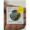 Image 1 : 2022 175th Anniversary of the birth of Alexander Graham Bell Loonie Dollar. Colourized. MS64.