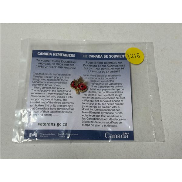 Canada Remembers Maple Leaf and Poppy Pin. Housed in its original packaging.