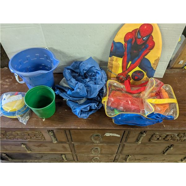 Kids beach toys, sand pail, floatys, etc.