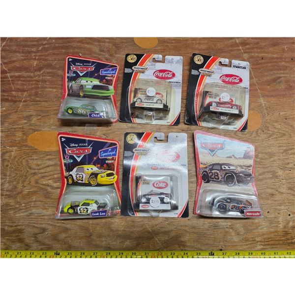 Sealed disney and matchbox  diecast cars