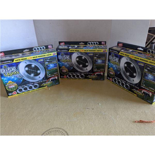 3 packs, new in box, solar disk lights