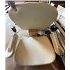 Image 7 : Straight stairlift system, with its motorized chair unit, padded seat, and an extruded aluminum modu