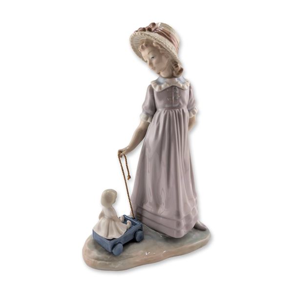 Lladro Girl with Toy Wagon Figurine 01005044